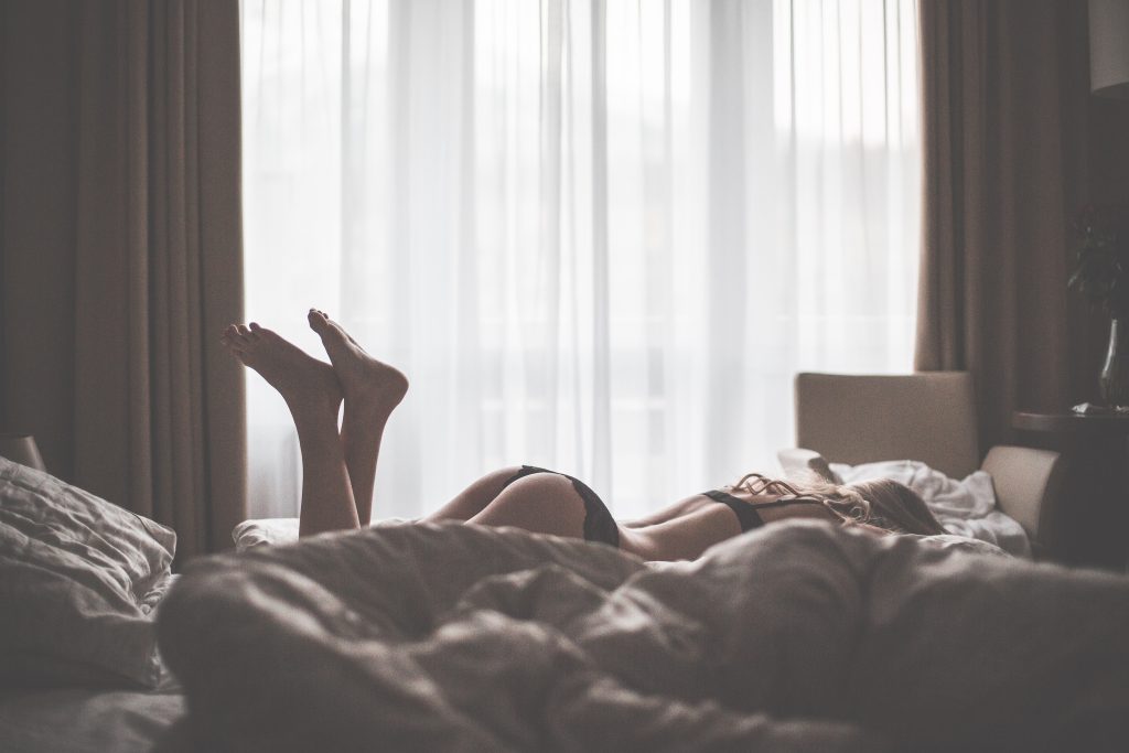 sensual-woman-in-lingerie-enjoying-her-time-in-bed-picjumbo-com